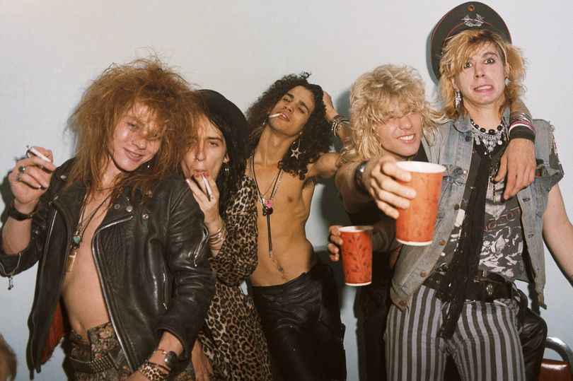 Axl-Rose-Izzy-Stradlin-Slash-Steven-Adler-and-Duff-McKagan-of-the-rock-group-Guns-n-Roses guns and roses sweet child